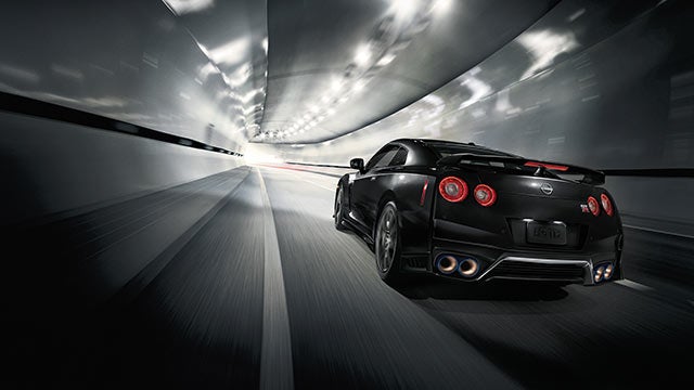 2023 Nissan GT-R seen from behind driving through a tunnel | Serra Nissan of Sylacauga in Sylacauga AL